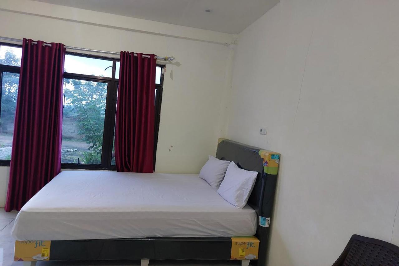 Oyo 92545 Wawi Kadio Homestay Manado Buitenkant foto