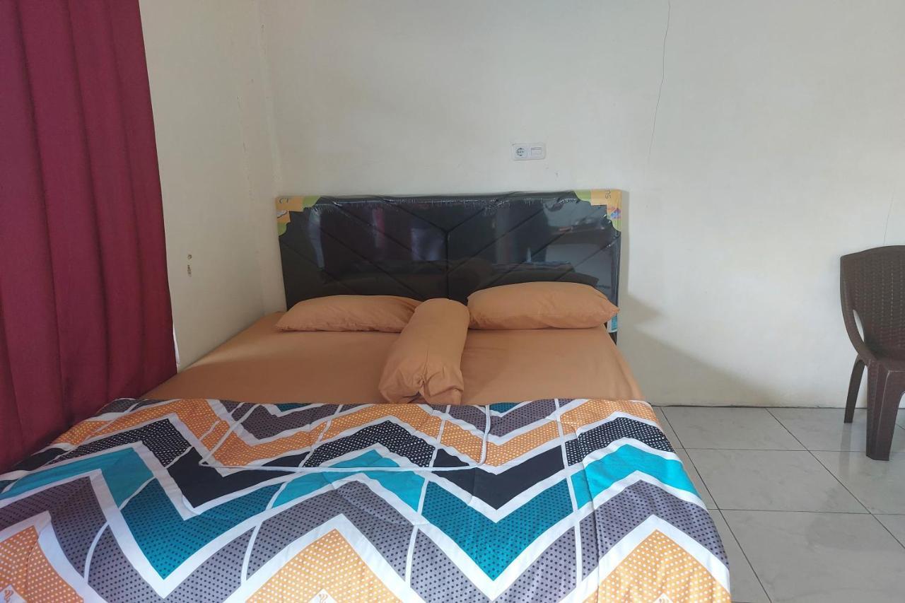 Oyo 92545 Wawi Kadio Homestay Manado Buitenkant foto